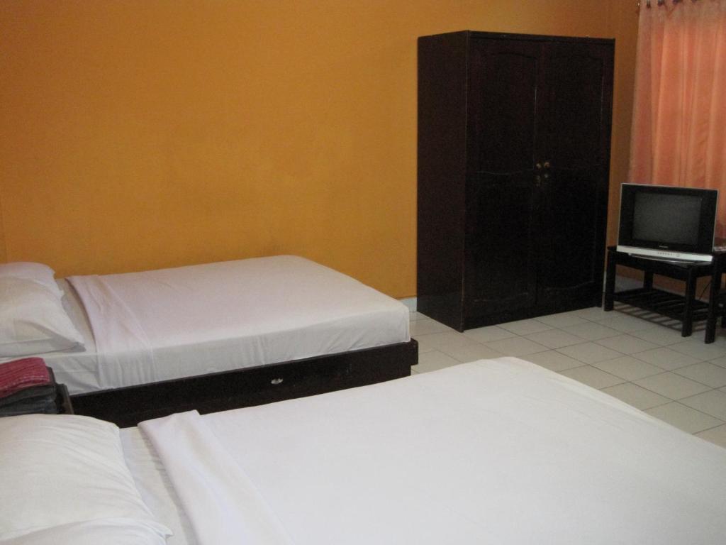 Sekar Sari Inn Кута Номер фото