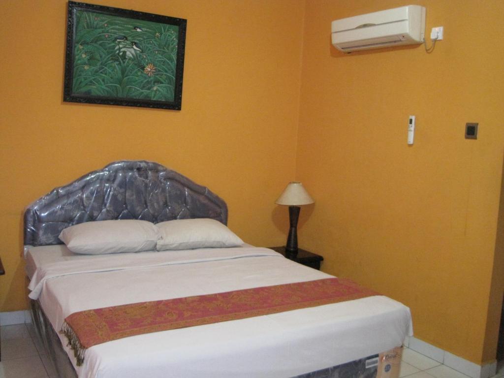 Sekar Sari Inn Кута Номер фото